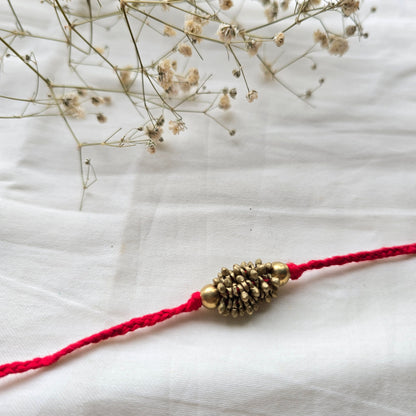 Zarna Brass Beads Rakhi - English colors