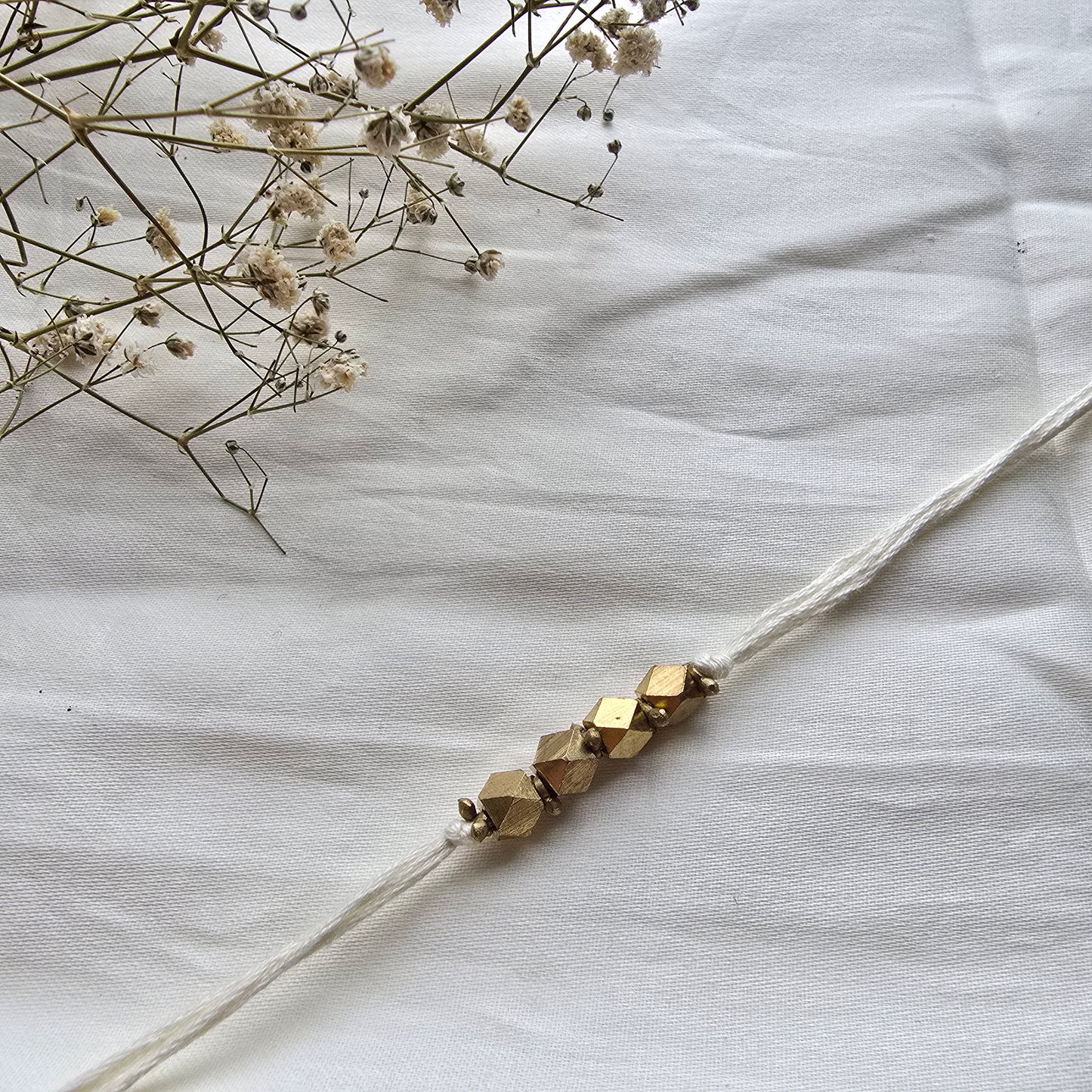4 Beads Brass rakhi - english colors