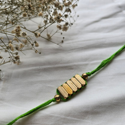 Rectangle Brass Beads Rakhi - english color