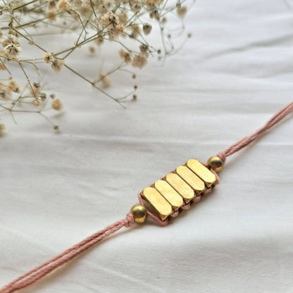 Rectangle Brass Beads Rakhi - english color