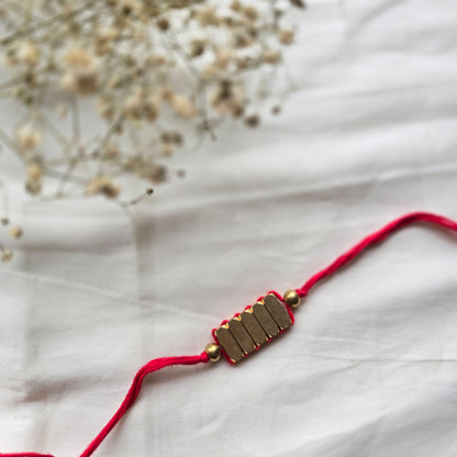 Rectangle Brass Beads Rakhi - english color