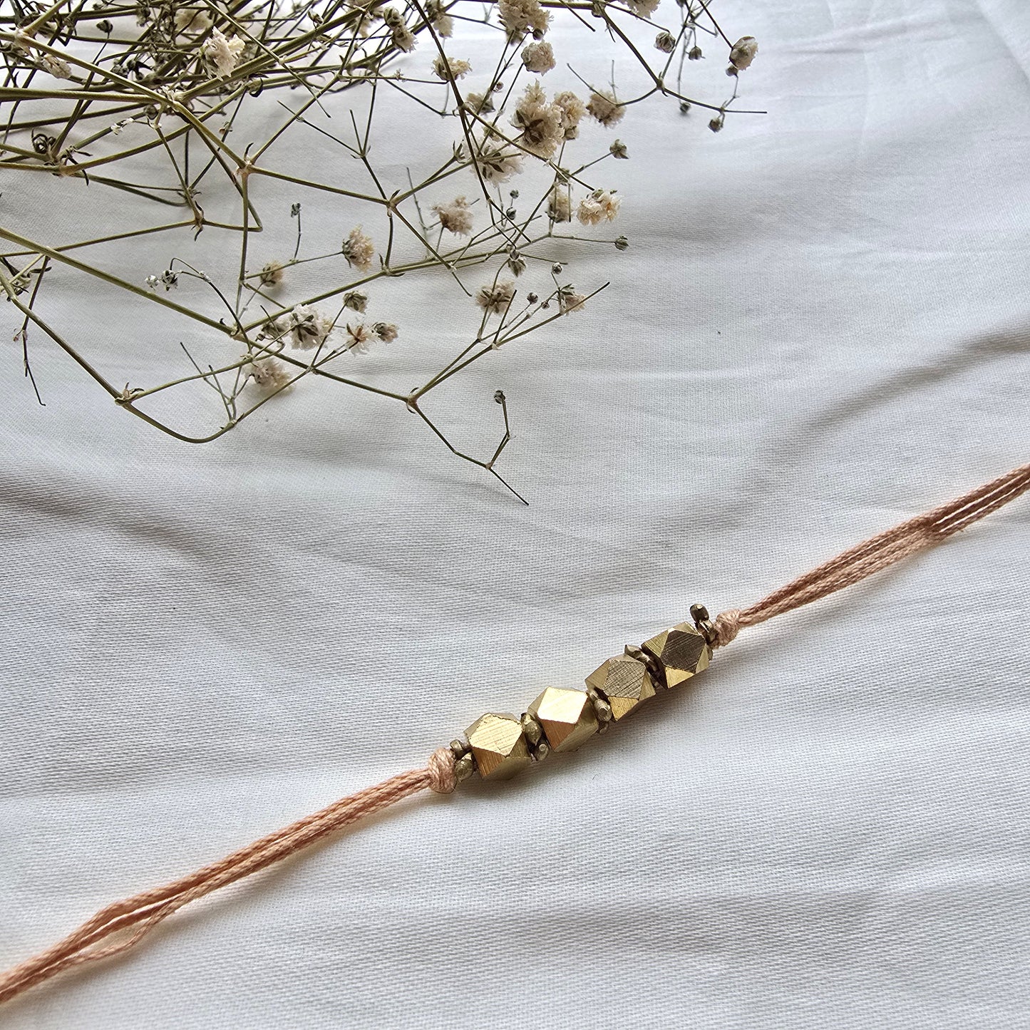 4 Beads Brass rakhi - english colors